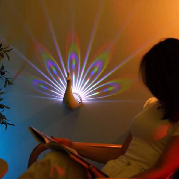Three -dimensional colored wall lamp in the form of peacocks